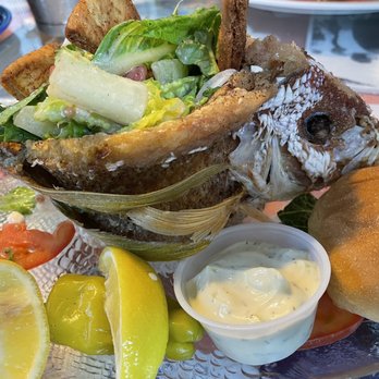 Mrs Mac's Kitchen II - Fried whole snapper stuffed with a Greek salad. So delicious! It also comes with a side of rice and beans. - American Near Me - Key Largo, Florida Mrs Mac's Kitchen II - Fried whole snapper stuffed with a Greek salad. So delicious! It also comes with a side of rice and beans. - American Near Me - Key Largo, Florida