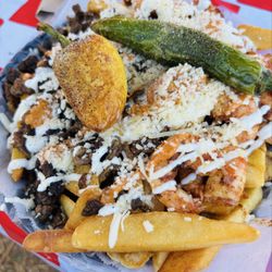 Mariscos El Huevon - Mar y tierra loaded fries!! Asada & shrimp fries!