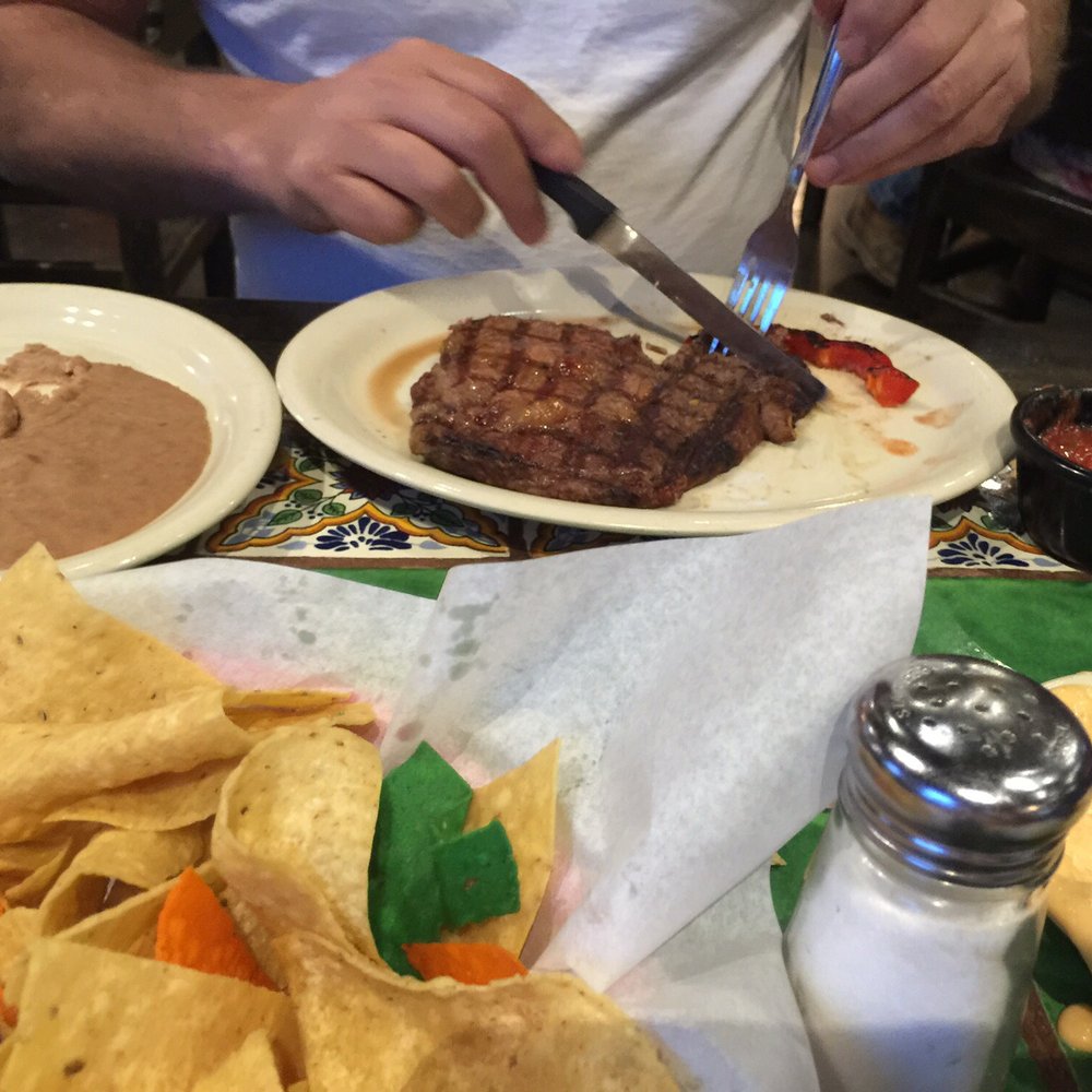 Papa Nachos - Rib eye steak with refried beans - Tex-Mex Near Me - Pittsburg, Texas Papa Nachos - Rib eye steak with refried beans - Tex-Mex Near Me - Pittsburg, Texas