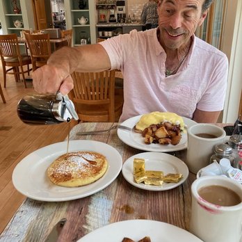 The Ipswich Inn - Michael pouring maple syrup on a buttermilk pancake! - Breakfast & Brunch Near Me - Ipswich, Massachusetts The Ipswich Inn - Michael pouring maple syrup on a buttermilk pancake! - Breakfast & Brunch Near Me - Ipswich, Massachusetts