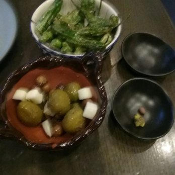 Mita's Restaurant and Bar - Blistered shishito peppers and Spanish olives with goat cheese. - Spanish Near Me - Cincinnati, Ohio Mita's Restaurant and Bar - Blistered shishito peppers and Spanish olives with goat cheese. - Spanish Near Me - Cincinnati, Ohio