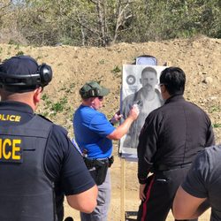 Basic Firearms Training - Instructor class talking about sight alignment.