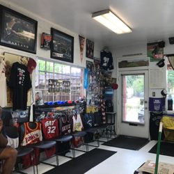 All Welcome Barber Shop - Love all the sports theme. Reminds me of my man cave