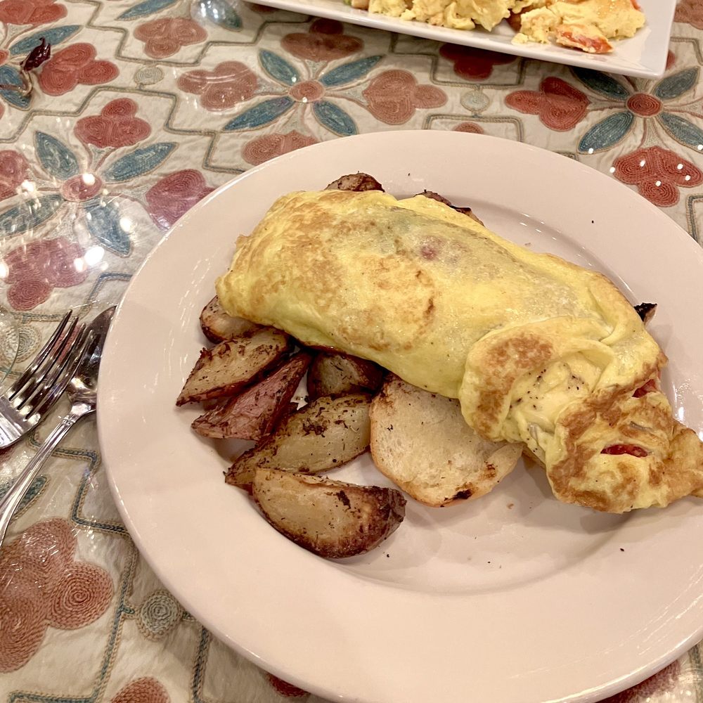 CAV Restaurant - Omelet with Balsamic Caramelized Onions, Goat Cheese and Tomatoes - New American Near Me - Providence, Rhode Island CAV Restaurant - Omelet with Balsamic Caramelized Onions, Goat Cheese and Tomatoes - New American Near Me - Providence, Rhode Island