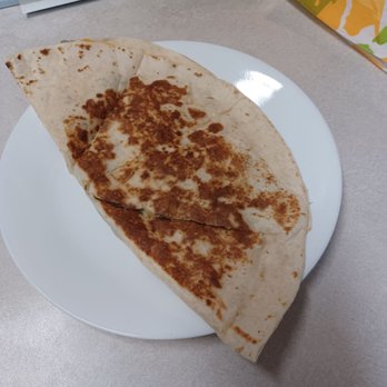 Taco Bell - Steak breakfast quesadilla cut in 4 pieces - Fast Food Near Me - Honolulu, Hawaii Taco Bell - Steak breakfast quesadilla cut in 4 pieces - Fast Food Near Me - Honolulu, Hawaii