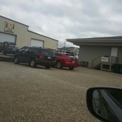Dimensions Salon - They are located in the rear between coy's auto body and Perfection Auto Glass