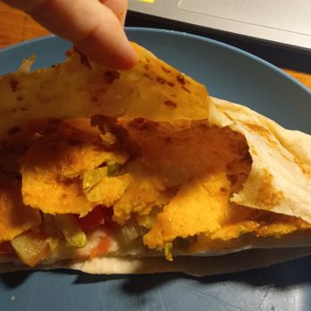 Taco Bell - Supposed to be a supreme crunchwrap.  No meat or cheese, and a soggy shell in the middle - Fast Food Near Me - Melbourne, Florida