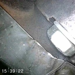 Random bolt used in place of where manifold stud should be