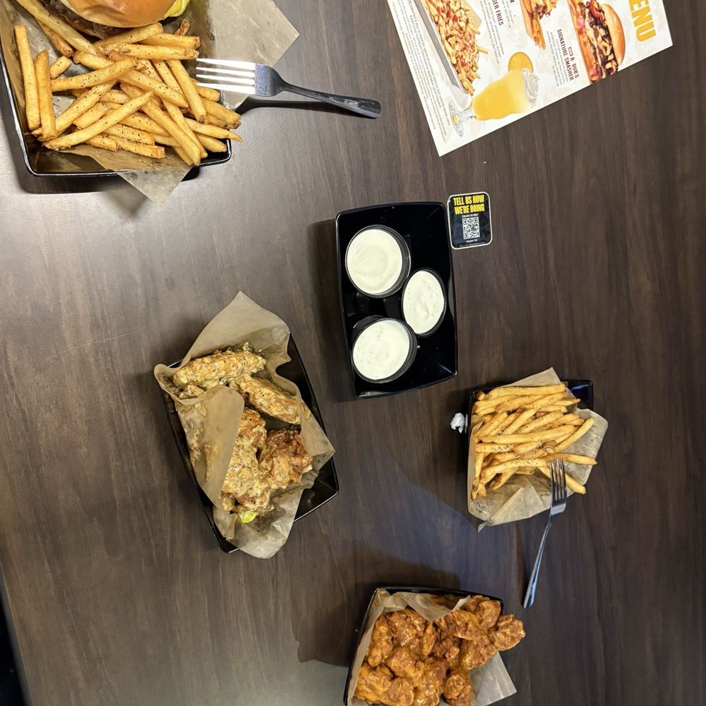 Buffalo Wild Wings - Burger, fries, Parmesan garlic wings, regular sauce wings, and fries. - Sports Bars Near Me - Fort Oglethorpe, Georgia Buffalo Wild Wings - Burger, fries, Parmesan garlic wings, regular sauce wings, and fries. - Sports Bars Near Me - Fort Oglethorpe, Georgia