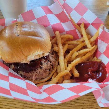 The Pit Bar-B-Q - Pulled Pork Sandwich with seasoned fries - Barbeque Near Me - Miami, Florida The Pit Bar-B-Q - Pulled Pork Sandwich with seasoned fries - Barbeque Near Me - Miami, Florida