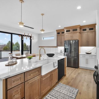 Lily Ann Cabinets - Bright kitchen with Craftsman White Shaker and Craftsman Natural Shaker cabinets, a waterfall island, and warm wood accents. - Kitchen & Bath Near Me - Largo, Florida Lily Ann Cabinets - Bright kitchen with Craftsman White Shaker and Craftsman Natural Shaker cabinets, a waterfall island, and warm wood accents. - Kitchen & Bath Near Me - Largo, Florida