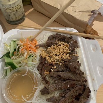 Pho Nguyen - a styrofoam container with meat and vegetables - Vietnamese Near Me - Montreal, Quebec