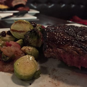 Epic SmokeHouse - The ribeye and bacon sprouts. The sprouts were delicious! - Steakhouses Near Me - Arlington, Virginia