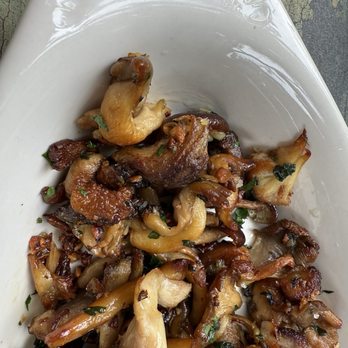 Roseland's Atlas - Flat #12 Mushrooms  Done to perfection! Only photographed partial dish because the rest was GONE before we thought of it. Delicious treat. - Italian Near Me - Buffalo, New York