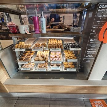 Dunkin' - a display of donuts in a donut shop - Donuts Near Me - Colorado Springs, Colorado Dunkin' - a display of donuts in a donut shop - Donuts Near Me - Colorado Springs, Colorado