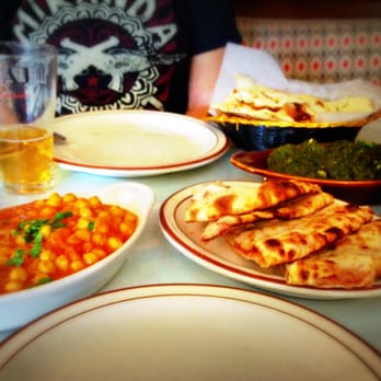 Himalayan Restaurant - Spicy garbanzo beans (chickpeas), lamb naan bread, Palak Paneer, garlic naan bread and Taj Mahal beer. - Indian Near Me - Big Bear Lake, California
