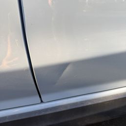Dented car door Dented car door