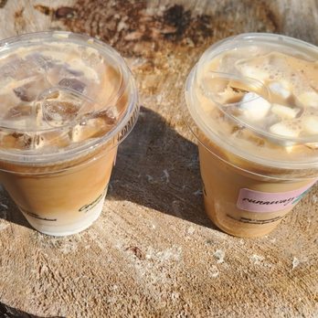 Runaway Cafe - two cups of iced coffee on a tree stump - Coffee & Tea Near Me - Toronto, Ontario Runaway Cafe - two cups of iced coffee on a tree stump - Coffee & Tea Near Me - Toronto, Ontario