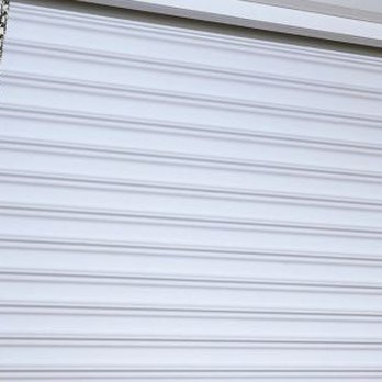 Upstate Door Company - a fire hydrant in front of a garage door - Garage Door Services Near Me - Greenville, South Carolina Upstate Door Company - a fire hydrant in front of a garage door - Garage Door Services Near Me - Greenville, South Carolina
