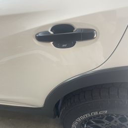 Rear door handle wrapped
