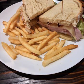 Jayroe's Texas Bistro - Club sandwich on sourdough - American Near Me - Rockport, Texas Jayroe's Texas Bistro - Club sandwich on sourdough - American Near Me - Rockport, Texas