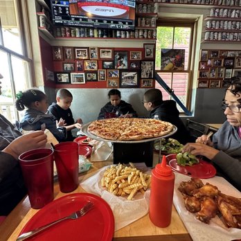 Davanza's - Meat Lovers with Extra Cheese, fries, and BBQ wings. Super quick and super amazing! - Pizza Near Me - Park City, Utah Davanza's - Meat Lovers with Extra Cheese, fries, and BBQ wings. Super quick and super amazing! - Pizza Near Me - Park City, Utah