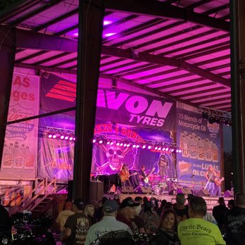 Spokes & Bones Saloon - a band performing on stage - Sports Bars Near Me - Murrells Inlet, South Carolina