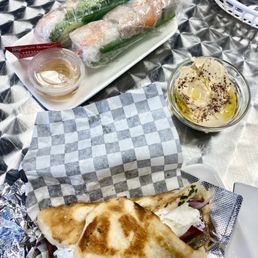 Shrimp & Pork Spring rolls.  Hummus side.  Middle eastern 'hero'.