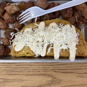 Arepas Street - Arepa with cheese inside and fried pork pieces. I can't find it on the menu..but the lady will help you - Venezuelan Near Me - Lewisville, Texas