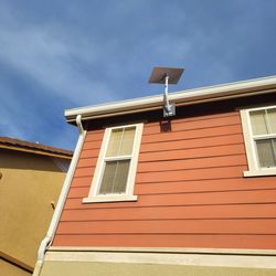 Scott's Antenna & Satellite Systems - Starlink installed on roof edge of 2 story home with tile roof.