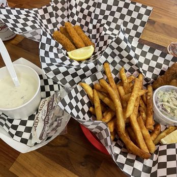 The battered Fish N Chips - Lunch on a rainy day. Calamari, Clam Chowder, and Cod. Served hot and fresh. - Fish & Chips Near Me - Tualatin, Oregon The battered Fish N Chips - Lunch on a rainy day. Calamari, Clam Chowder, and Cod. Served hot and fresh. - Fish & Chips Near Me - Tualatin, Oregon