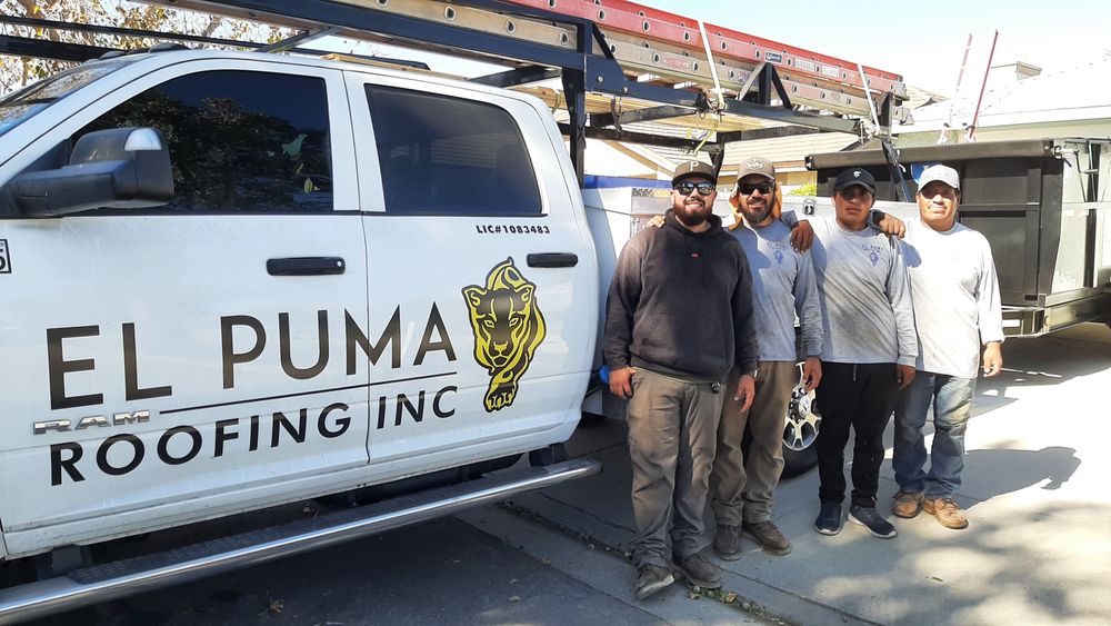 Slide of El Puma Roofing