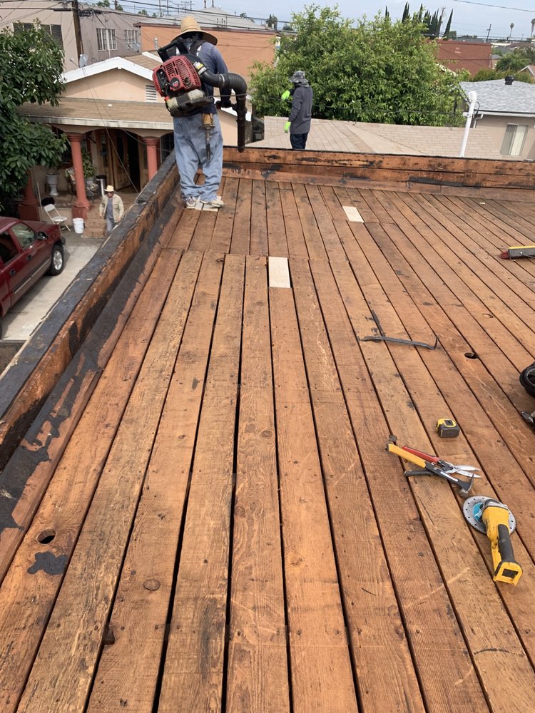 Slide of Pacific Roofing