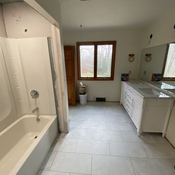 R&S Painting - Remodeling - a bathroom with a tub, sink, and shower - Painters Near Me R&S Painting - Remodeling - a bathroom with a tub, sink, and shower - Painters Near Me