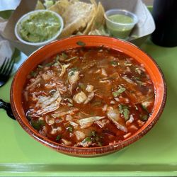 Highlands Burrito - Red pozole with chips, fresh guacamole and red hibiscus tea.