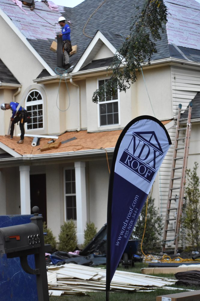 Slide of NDX Roofing and Restoration