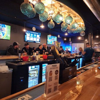 River Town Tavern - people sitting at the bar - Beer Gardens Near Me - Trenton, Michigan