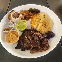 Great flavor, bone Marrow ok. Was 12 oz  Beans were good wish I had more.  25$ seems different plates in people's photos.