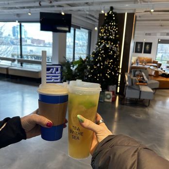 TeaByTheSea - two people holding cups of tea - Bubble Tea Near Me - Boston, Massachusetts