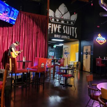 Five Suits Brewing - a man and a woman playing guitar - Breweries Near Me - Vista, California Five Suits Brewing - a man and a woman playing guitar - Breweries Near Me - Vista, California