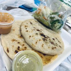Mi Tierra Taqueria Y Pupuseria - The Chicken and Cheese Pupusa was so flavorful! The bean and Cheese mixed so well with their red sauce!