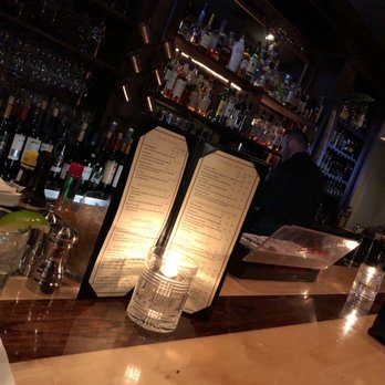 Landmark Restaurant - a bar with menus and wine glasses - Steakhouses Near Me - Jamestown, New York