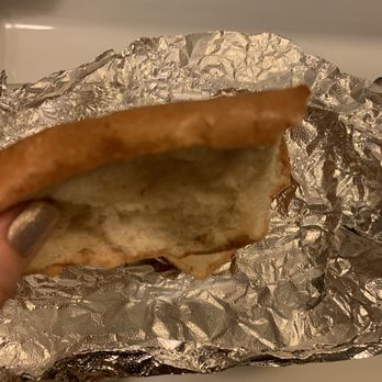 Piazza 27 - "garlic bread" with no garlic or seasoning... it's the bottom of a sub roll. - Pizza Near Me - Baltimore, Maryland