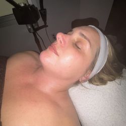 Elite Essential Esthetics - Client glowing after Elite Custom Facial
