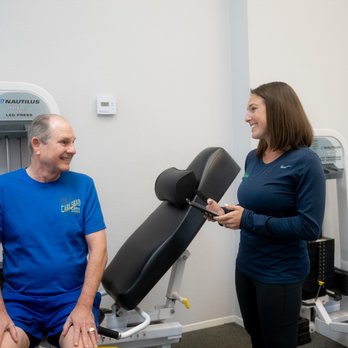 The Perfect Workout - Client talking to trainer about their results - Trainers Near Me - Paoli, Pennsylvania The Perfect Workout - Client talking to trainer about their results - Trainers Near Me - Paoli, Pennsylvania