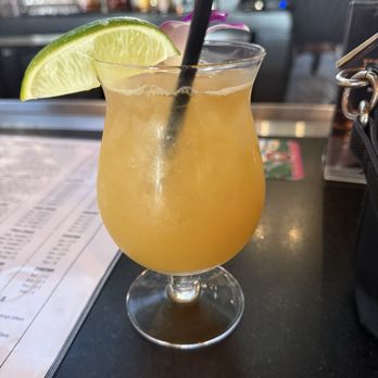 38 Degrees Ale House & Grill - Pineapple  Mai Tai! You can barely make out the fresh flower behind the straw - Pubs Near Me - Alhambra, California