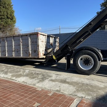 Same Day Dumpster - Loading another unit - Dumpster Rental Near Me