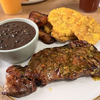 Papelon con limón - Churrasco with black beans, tostones and plantains - Burgers Near Me - Peachtree Corners, Georgia