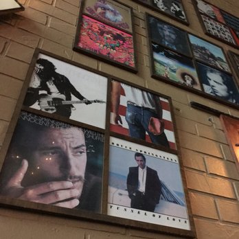 Village Idiot - Wall art includes album covers from the Boss. - Bars Near Me - Maumee, Ohio Village Idiot - Wall art includes album covers from the Boss. - Bars Near Me - Maumee, Ohio