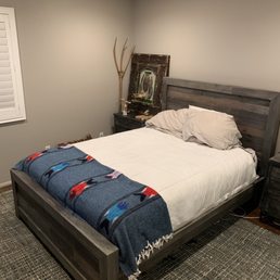 Wood bed frame and rug Wood bed frame and rug